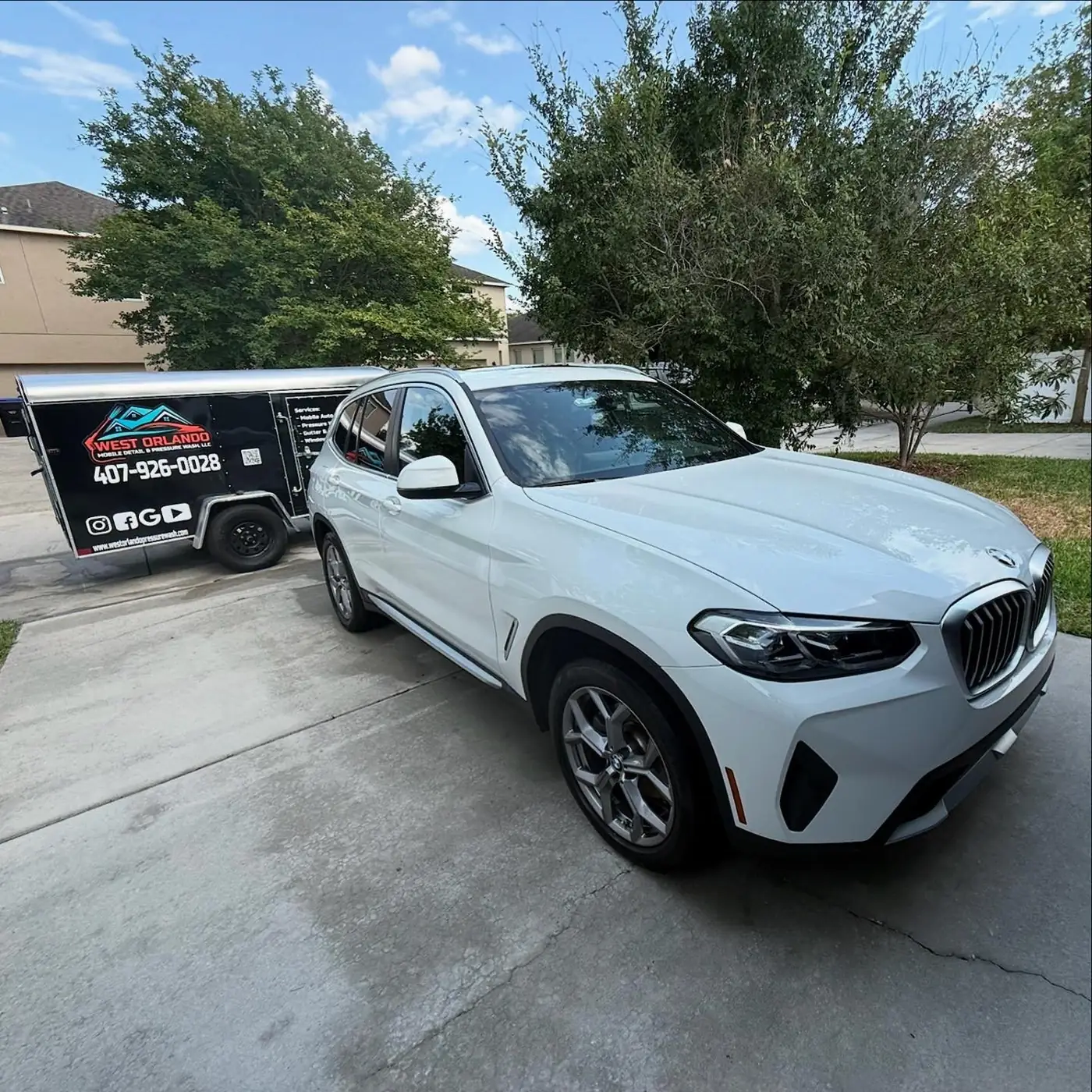 BMW X3 with the West Orlando trailer